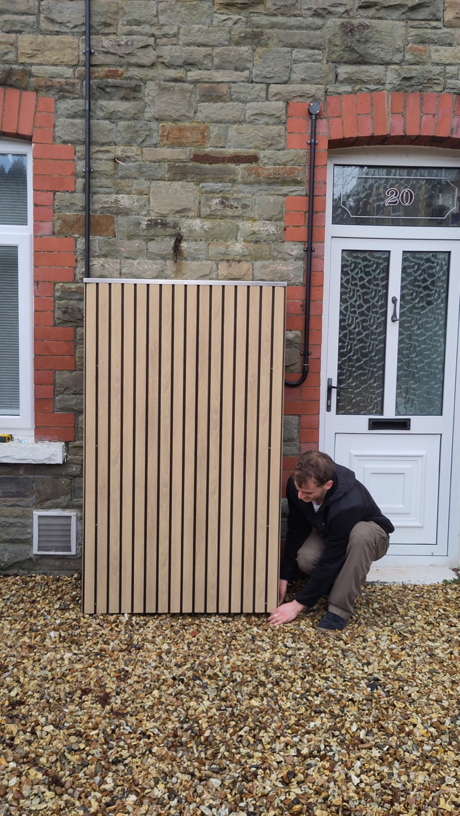 Toby installing an Embrace Renewables battery cover